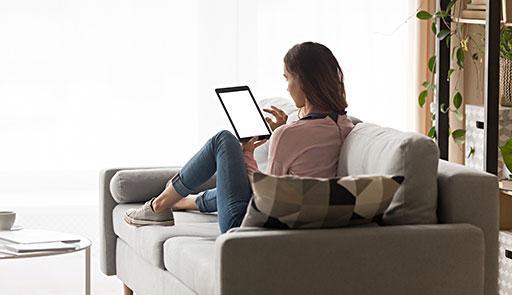 Student studying on the sofa